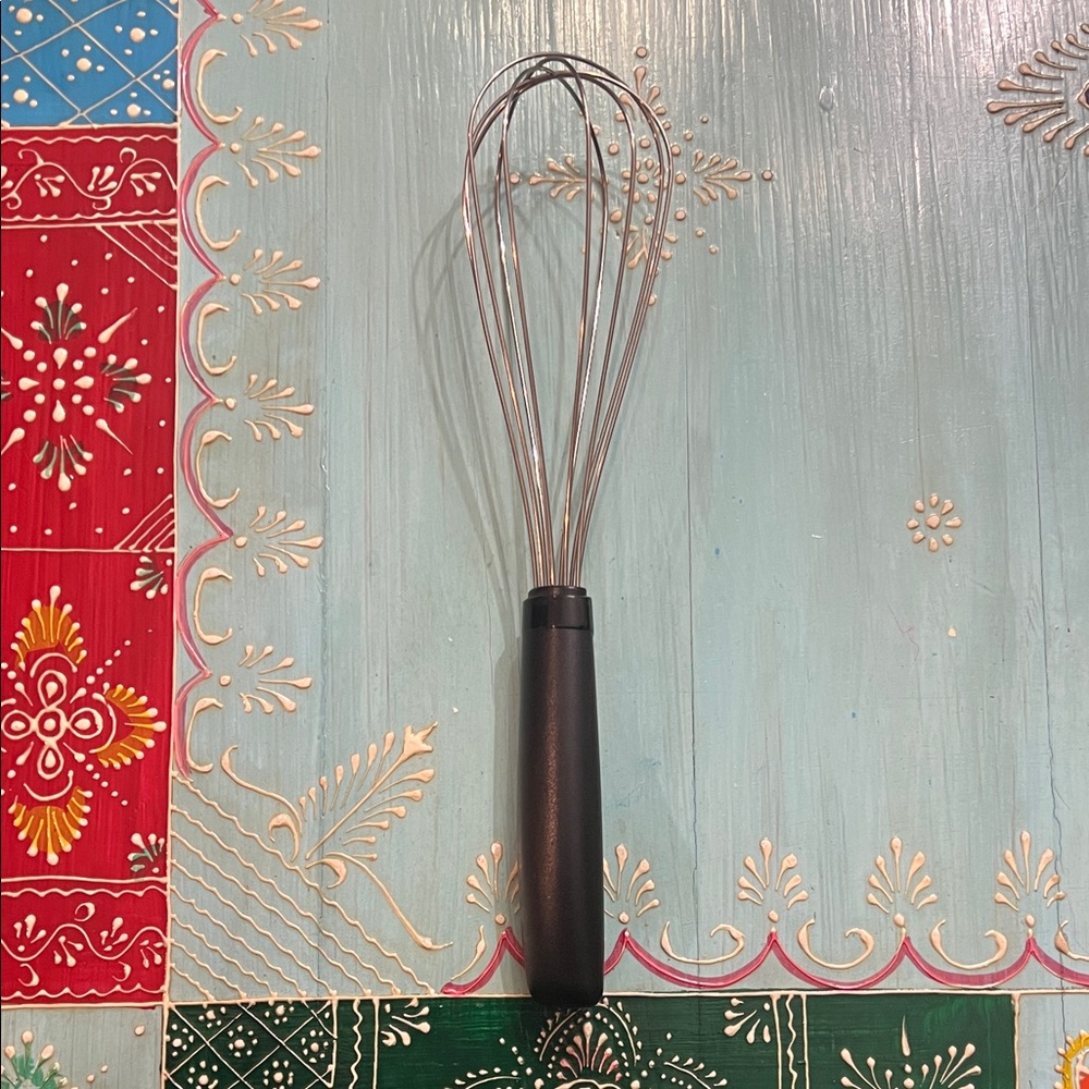 Stainless Steel and Black Whisk by [Brand]